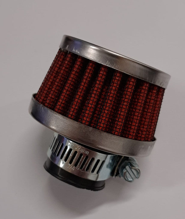 Kampikammion kartiosuodatin väriltään punainen jossa kiristys klemmari.